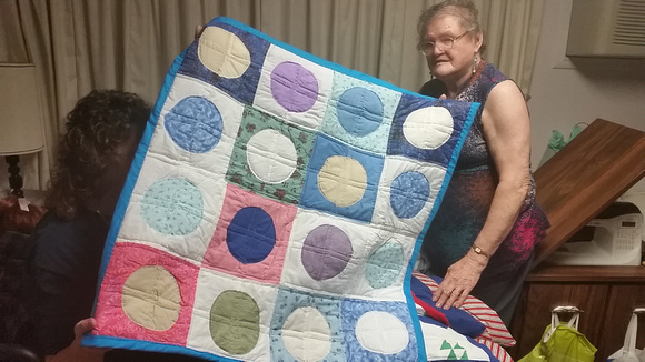 Mom with Quilt - start of Memorial